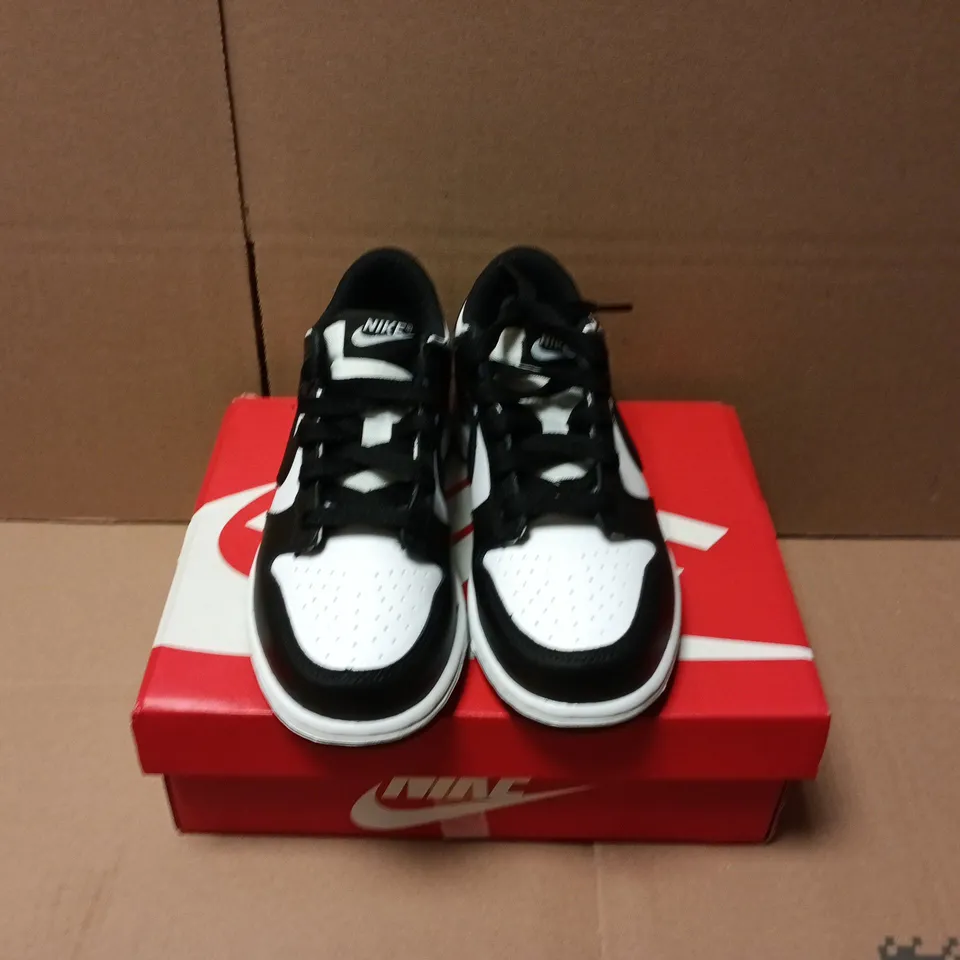 BOXED PAIR OF NIKE DUNK LOW TRAINERS IN WHITE/BLACK - UK 12.5