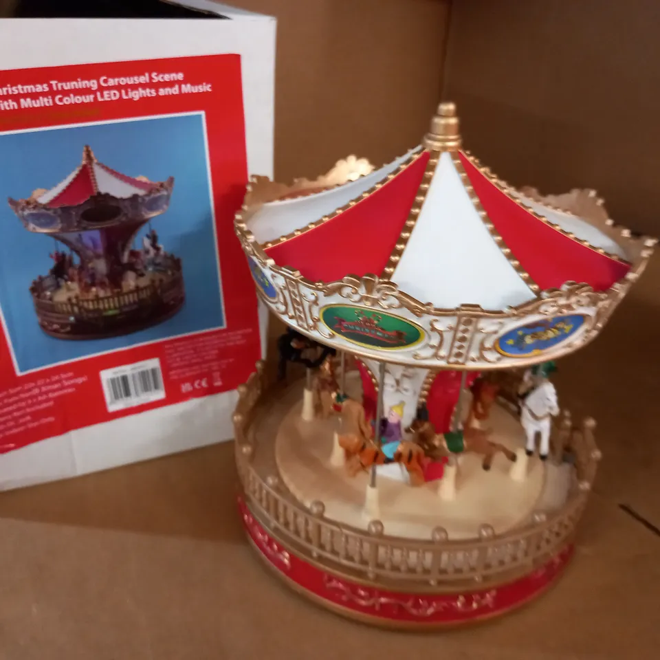 CHRISTMAS TURNING CAROUSEL SCENE WITH LED LIGHTS