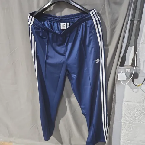 ADIDAS NAVY TRACK PANTS WITH WHITE STRIPES – UK XL