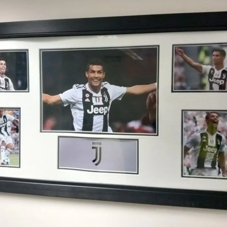 TWO FRAMED CRISTIANO RONALDO COLLAGES ONE DEPICTING HIS TIME AT REAL MADRID AND ONE DEPICTING HIS TIME WITH JUVENTUS