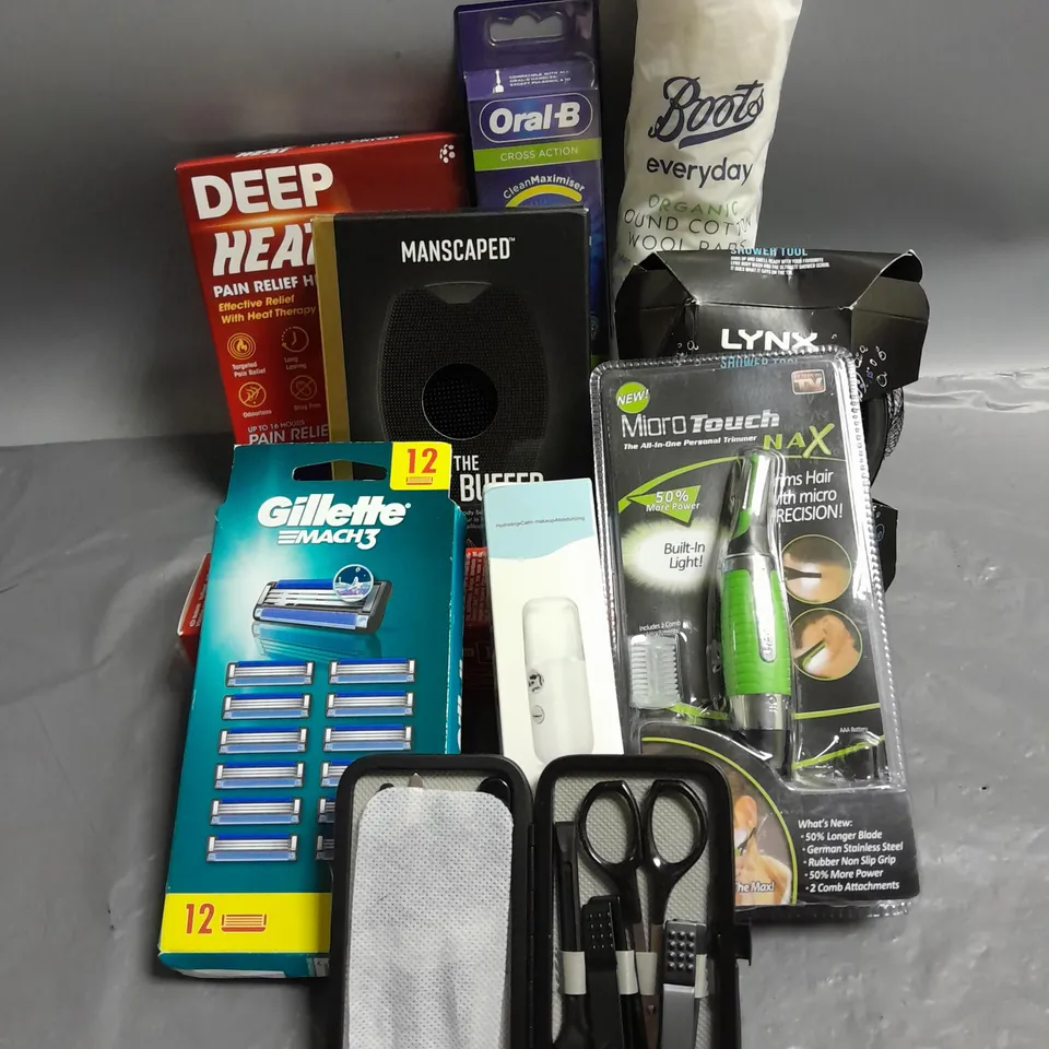 BOX OF APPROXIMATELY 10 COSMETIC ITEMS TO INCLUDE - MANSCAPED BODY BUFFER - GILLETTE MACH3 BLADE PACK - ORAL B BRUSH HEADS - ETC