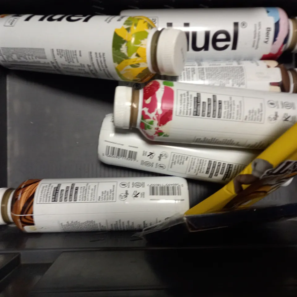 TOTE OF APPROX 11 ASSORTED FOOD ITEMS TO INCLUDE -  HUEL BANANA , DRIZZILICIOUS SALTED CARAMEL BITES , HUEL BERRY ETC