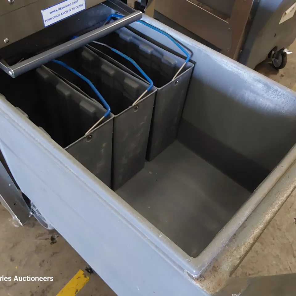 FOLLETT COMMERCIAL ICE MACHINE ON STAND WITH ICE TROLLEY