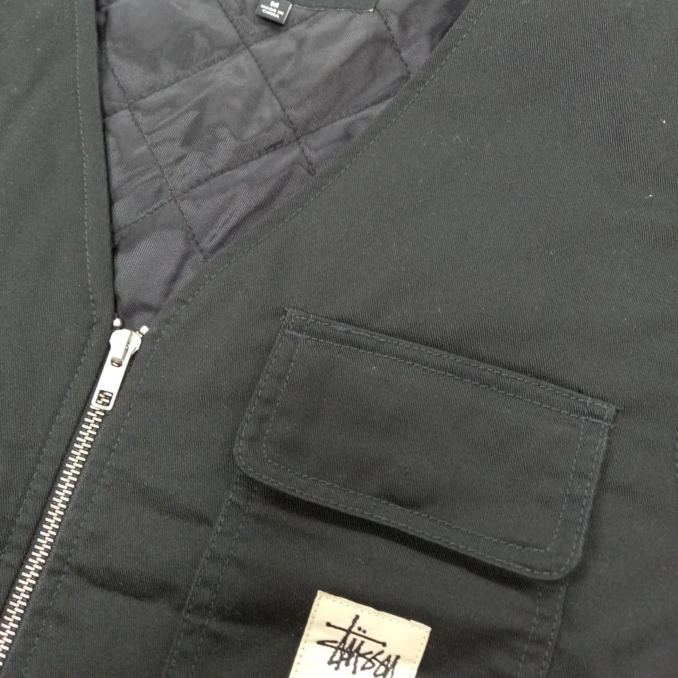 STUSSY POCKETED WAIST COAT IN BLACK - M