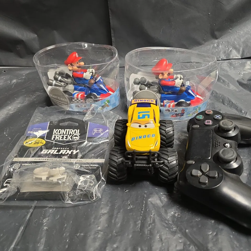 APPROXIMATELY 10 ASSORTED TOYS & GAMES PRODUCTS TO INCLUDE , PS3 CONTROLLER , REVISION CARDS , ETC 