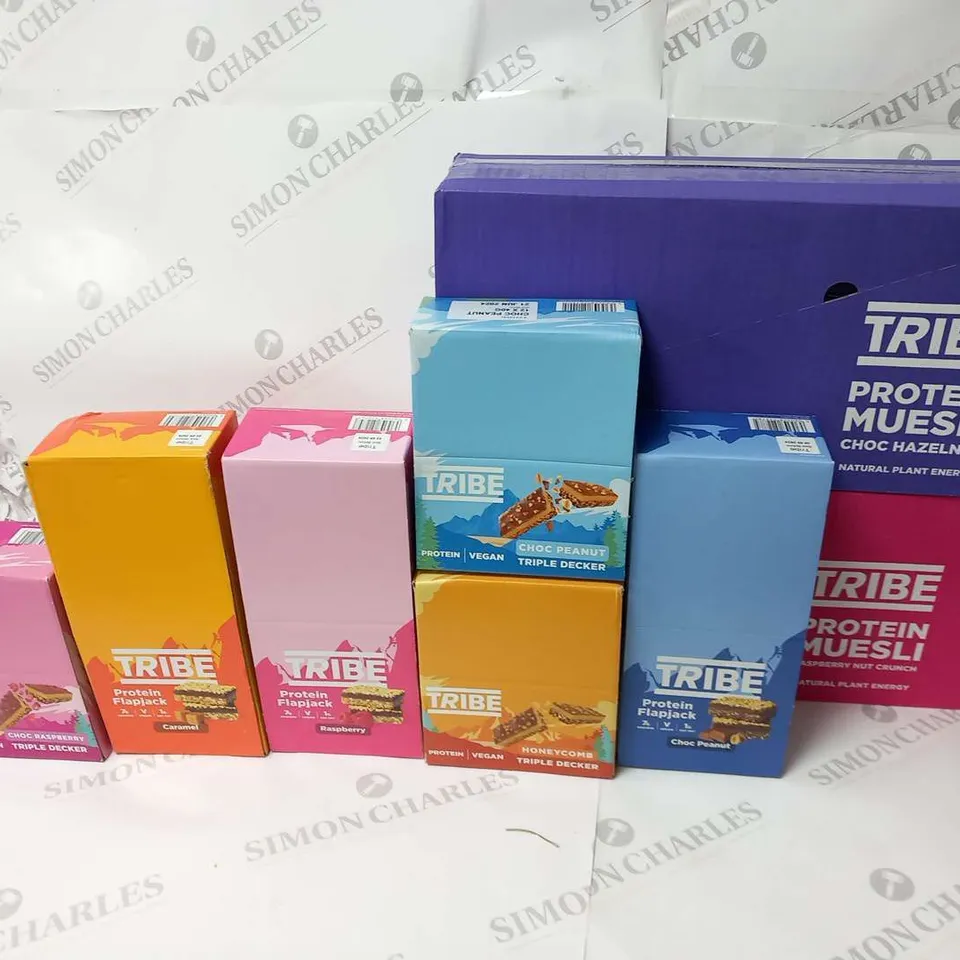 APPROXIMATELY SEVEN PACKS OF TRIBE PRODUCTS TO INCLUDE; 2 PACKS OF 8 PROTEIN MUESLI POTS, 3 PACKS OF 12 X 50G PROTEIN FLAPJACKS AND 3 PACKS OF 12 X 40G TRIPLE DECKERS