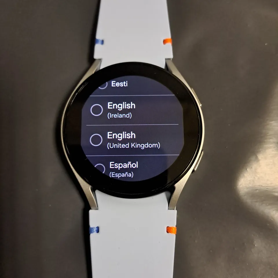 BOXED SAMSUNG GALAXY WATCH FE 40MM IN SILVER WITH BLUE STRAP - RM-R861