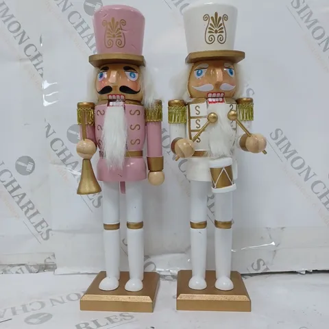 SET OF 2 12" NUTCRACKERS PINK AND WHITE