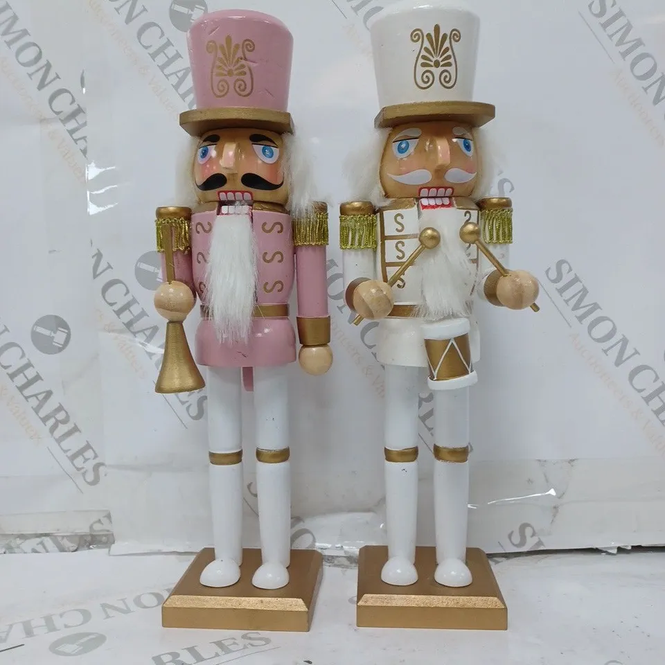 SET OF 2 12" NUTCRACKERS PINK AND WHITE RRP £25.99