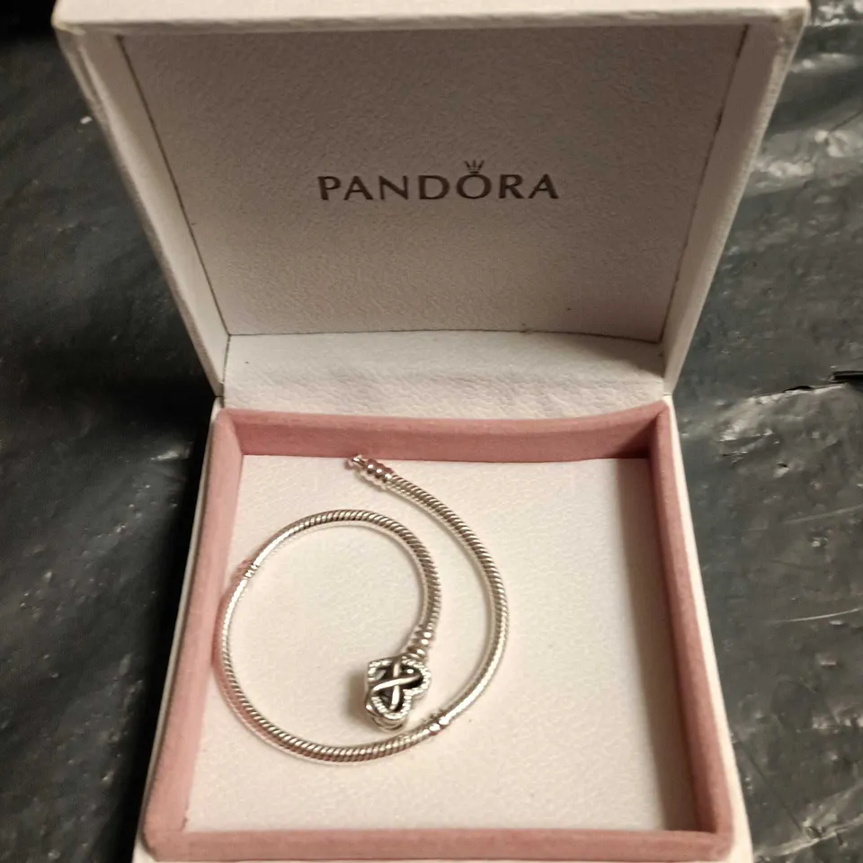 PANDORA BRACELET WITH KNOT CHARM PRESENTED IN PANDORA BOX
