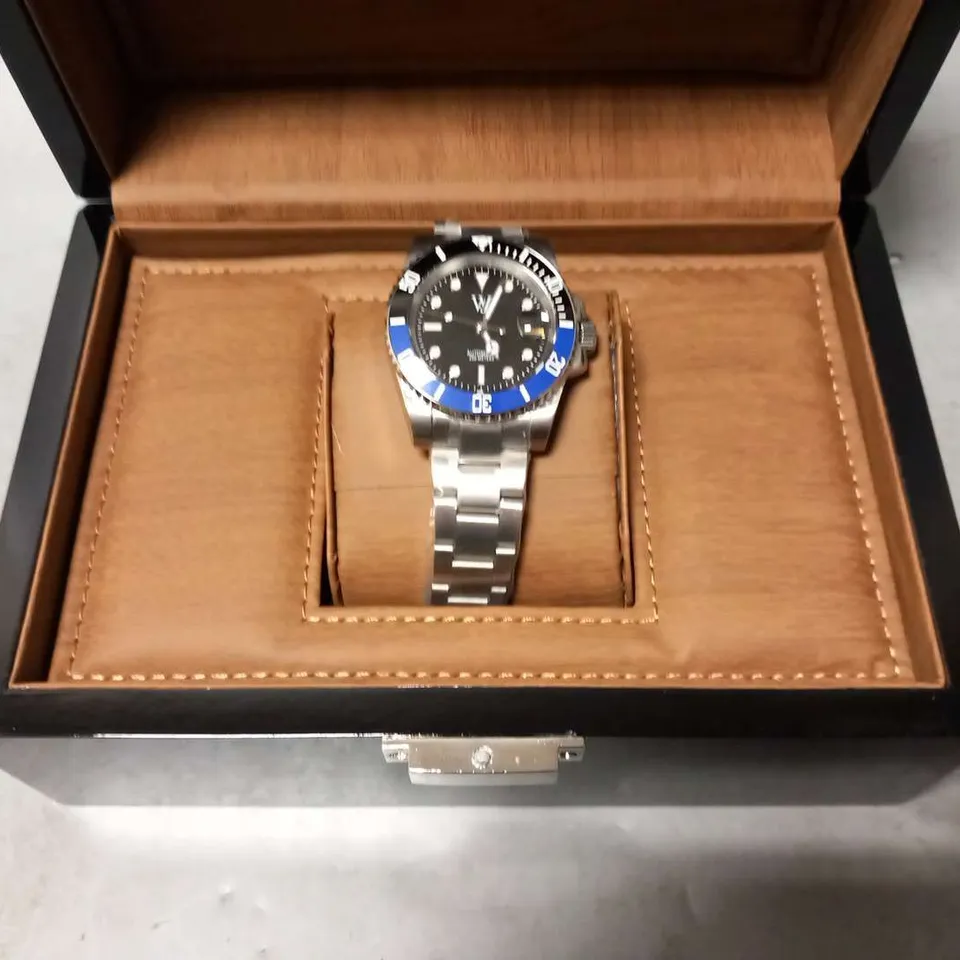 WILLIAM JOURDAIN STAINLESS STEEL WRIST WATCH WITH BLACK FACE IN PRESENTATION BOX