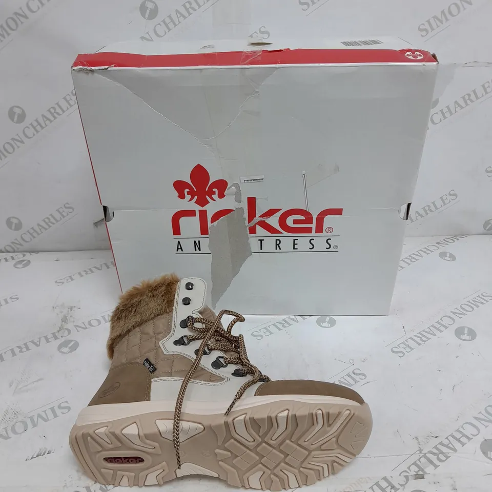 BOXED PAIR OF RIEKER CREAM WINTER FUR HIKE BOOTS IN SIZE 5 