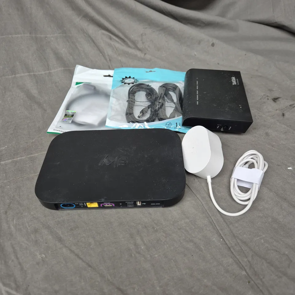 APPROXIMATELY 12 ASSORTED ELECTRICAL PRODUCTS TO INCLUDE CABLES, ROUTER, ETC