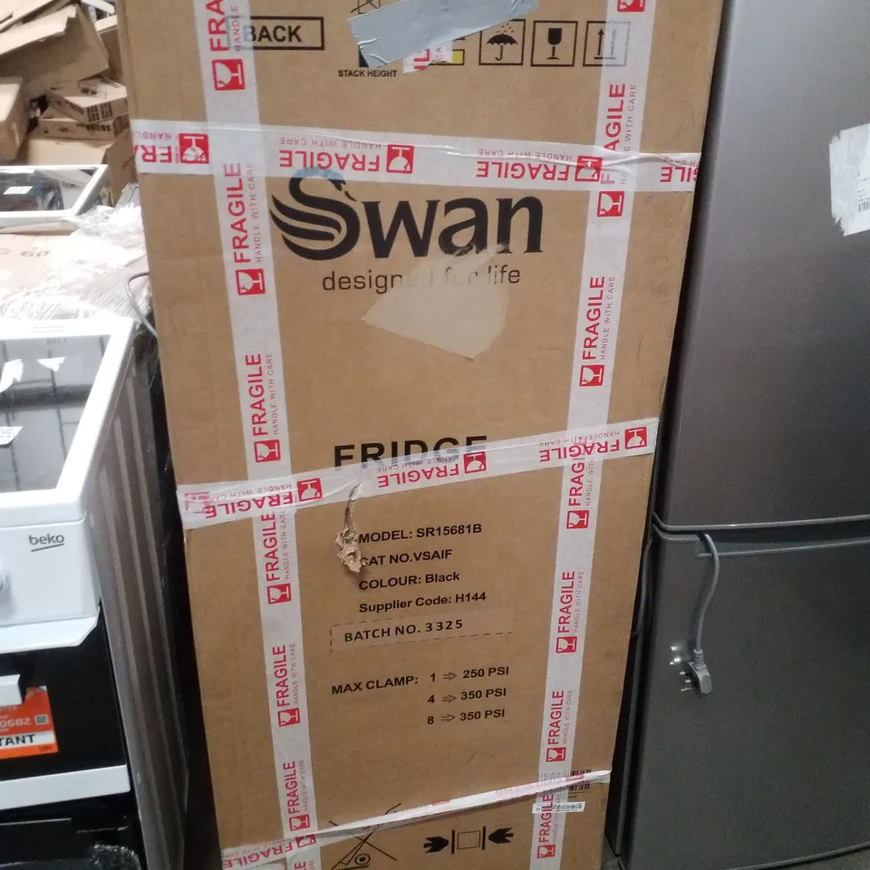 BOXED SWAN SR15681B 143CM HIGH, 55CM WIDE TALL LARDER FRIDGE - BLACK
