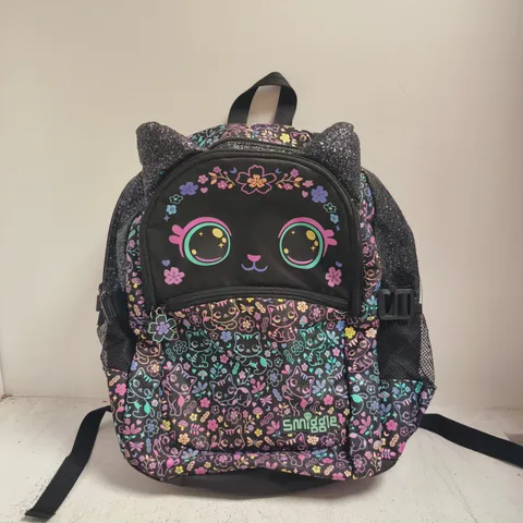SMIGGLE KIDS BACKPACK – CAT & FLORAL PRINT ON BLACK, GLITTERY EAR PANELS
