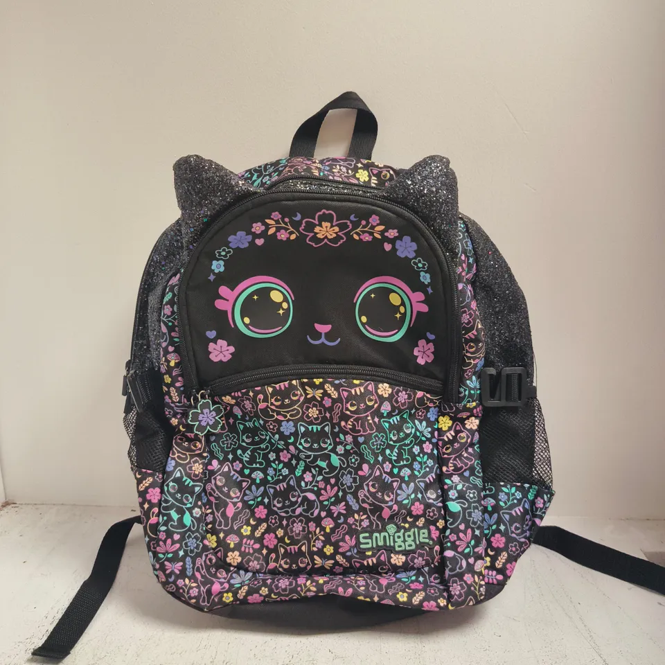 SMIGGLE KIDS BACKPACK – CAT & FLORAL PRINT ON BLACK, GLITTERY EAR PANELS