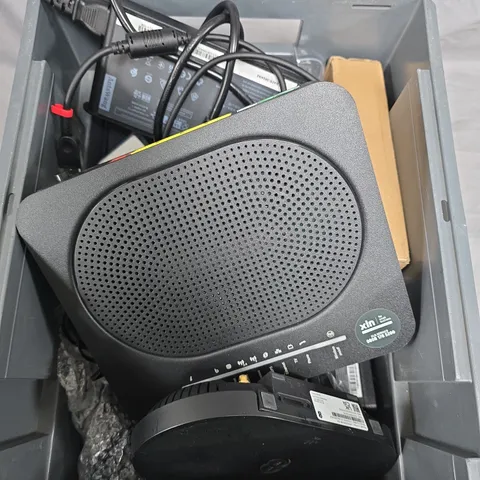 BOX OF ASSORTED CABLES AND MODEMS 