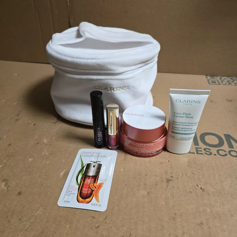 CLARINS SKINCARE GIFT SET WITH WHITE COSMETICS BAG