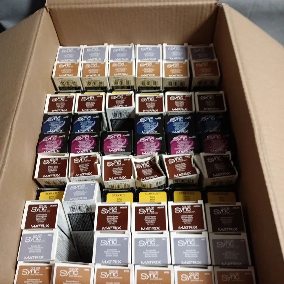BOX OF APPROXIMATELY 60 MATRIX HAIR CARE PRODUCTS INCLUDING COLOR SYNC BRUNETTE ASH/BRUNETTE NEUTRAL/BRUNETTE MOCHA/VIOLET/MAGENTA AND SO BOOST YELLOW