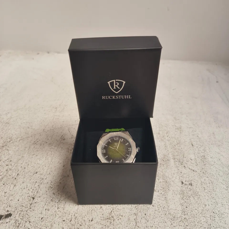 RUCKSTUHL STAINLESS STEEL WRISTWATCH WITH GREEN RUBBER STRAP – BOXED