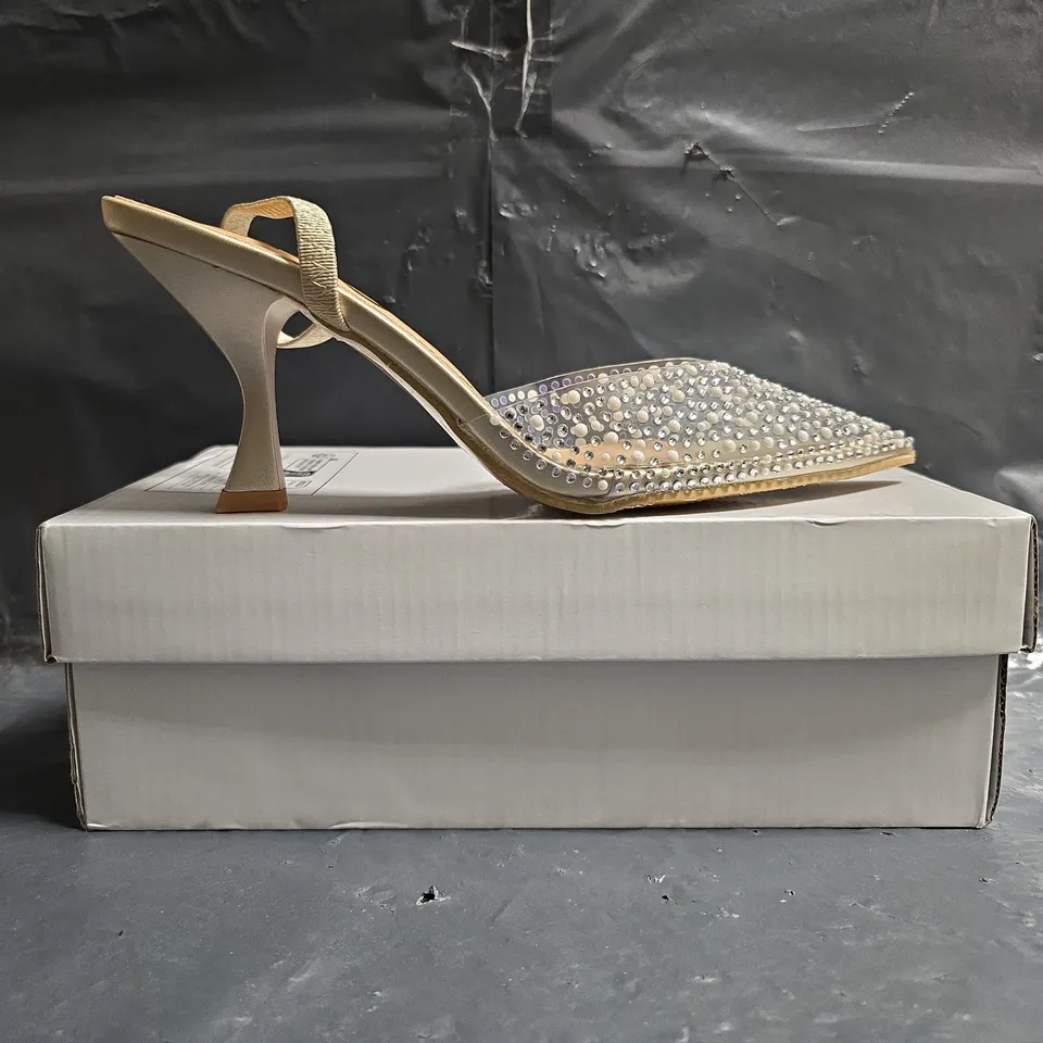 BOXED PAIR OF EGO POINTED TOE LOW HEEL SHOES IN CLEAR W. JEWEL DETAIL SIZE 5