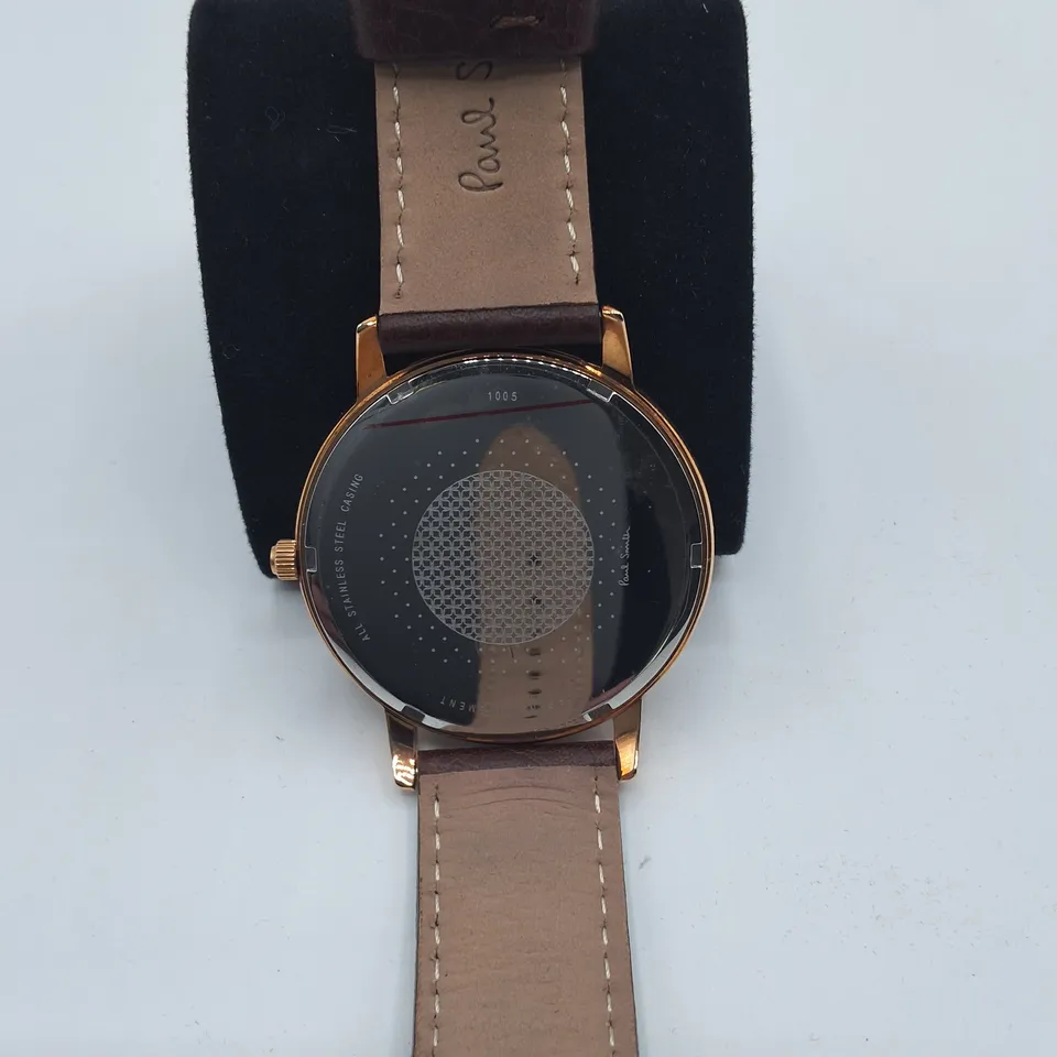 BOXED PAUL SMITH STAINLESS STEEL WATCH WITH JAPANESE MOVEMENT AND BROWN LEATHER STRAP