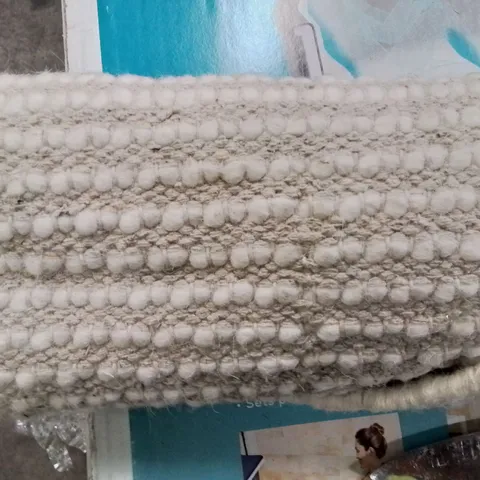 LARGE CREAM CIRCULAR AREA RUG