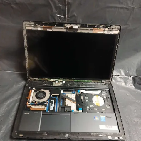 LAPTOP WITH EXPOSED INTERNALS – MODEL UNSPECIFIED