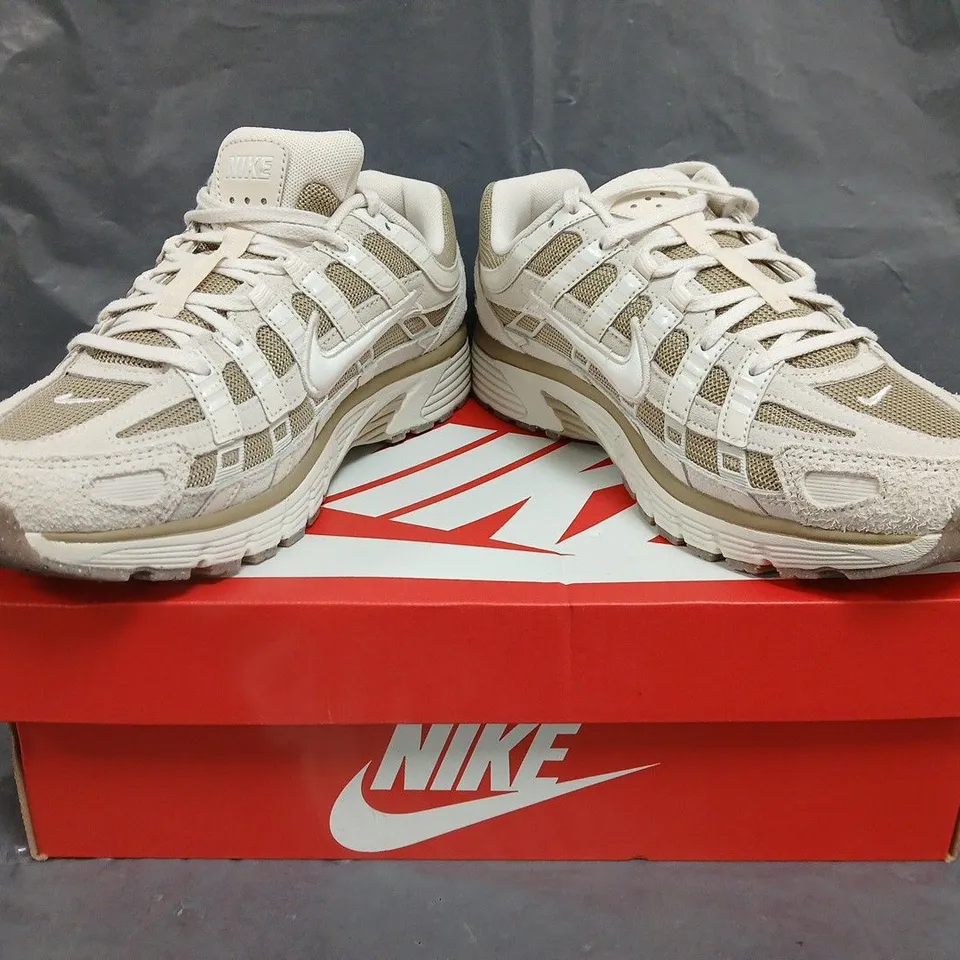 BOXED PAIR OF NIKE P-6000 SHOES IN BEIGE SIZE UK 7