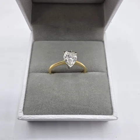 18CT GOLD SOLITARE RING SET WITH A NATURAL PEAR SHAPE DIAMOND WEIGHING +-1.07CT