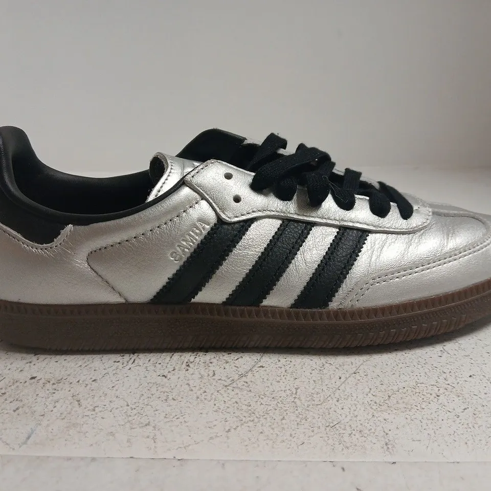 BOXED PAIR OF ADIDAS SAMBA-STYLE METALLIC SILVER TRAINERS –SIZE 8.5