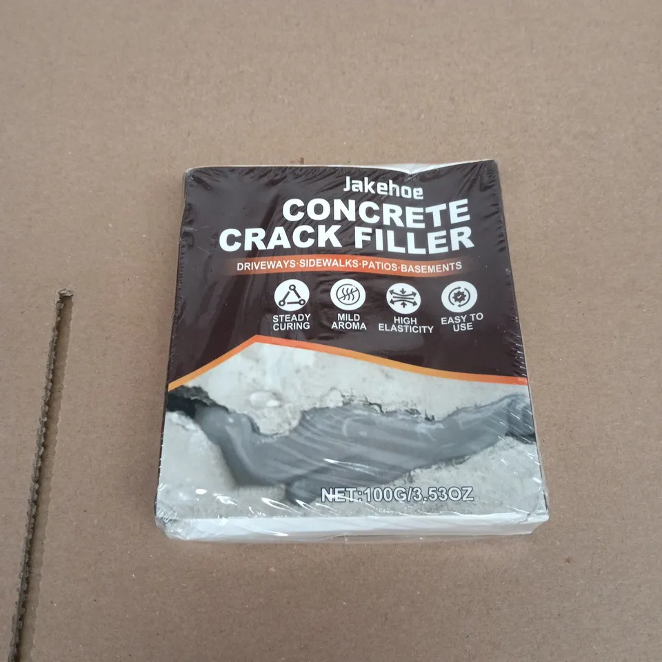 BOX OF APPROXIMATELY 10 ASSORTED GOODS INCLUDING JAKEHOE CONCRETE CRACK FILLER, VACUUM STORAGE BAG AND IPAD CASE
