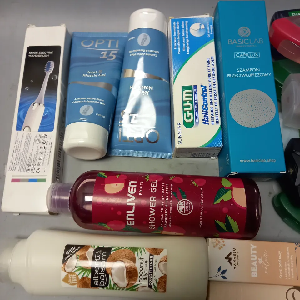 lot of approximately 18 assorted health and beauty items to include sonic electric toothbrush, apis almond oil and various shower gels