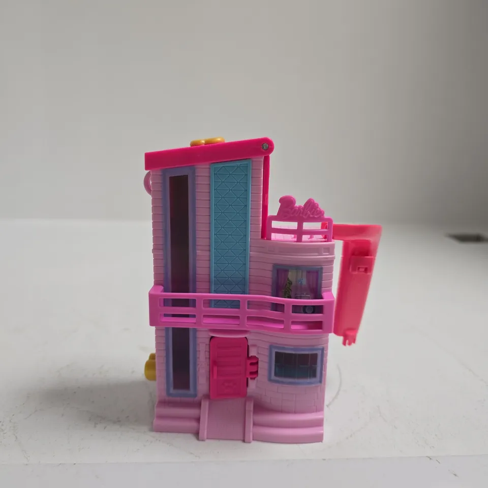 TOTE OF APPROXIMATELY 10 ASSORTED TOYS ICLUDING ELEPHANT MUSICIAN, BARBIE MINI HOUSE SET AND LITTLE LIVE PETS