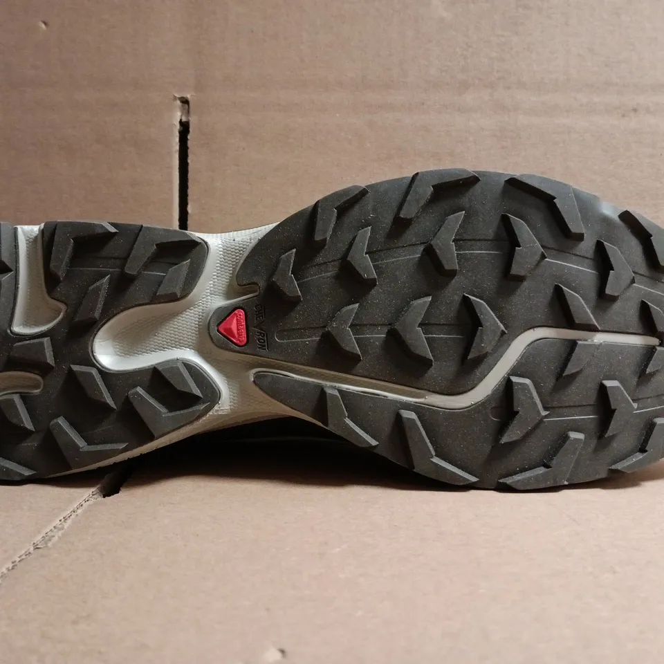 BOXED PAIR OF SALOMON TRAINERS IN LIGHT TAUPE SIZE UK 9.5