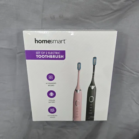 BOXED AND SEALED HOMESMART SET OF 2 ELECTRIC TOOTHBRUSHES – PINK & BLACK