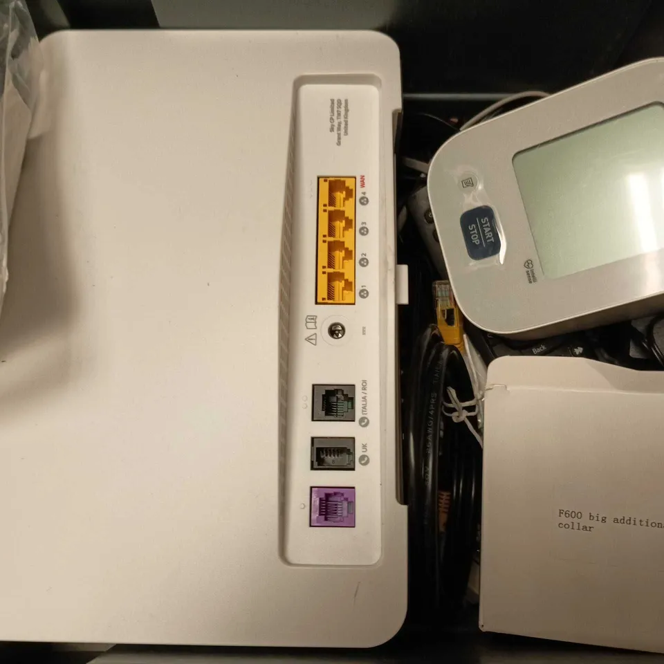 APPROXIMATELY 12 ASSORTED HOUSEHOLD ITEMS TO INCLUDE OMRON BLOOD PRESSURE MONITOR, ROUTERS, REMOTES, ETC