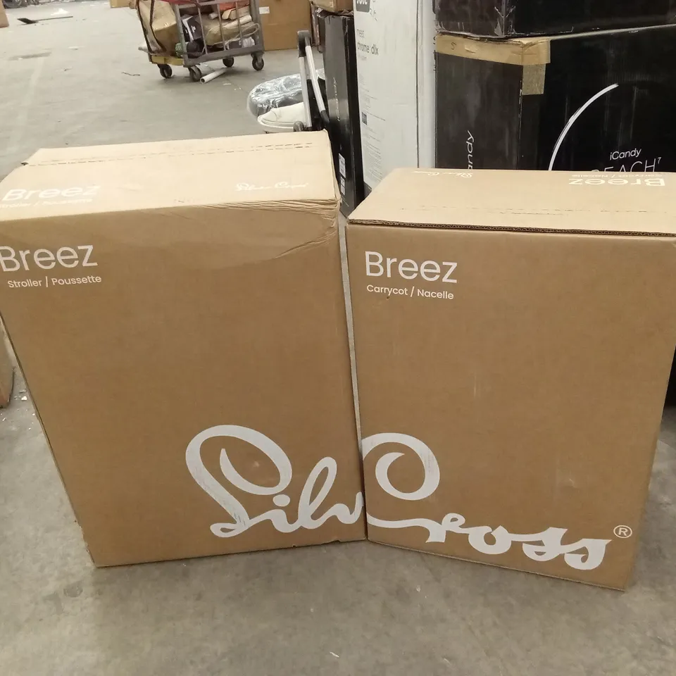 BOXED SILVER CROSS BREEZ STROLLER AND CARRYCOT - ONXY (2 BOXES)