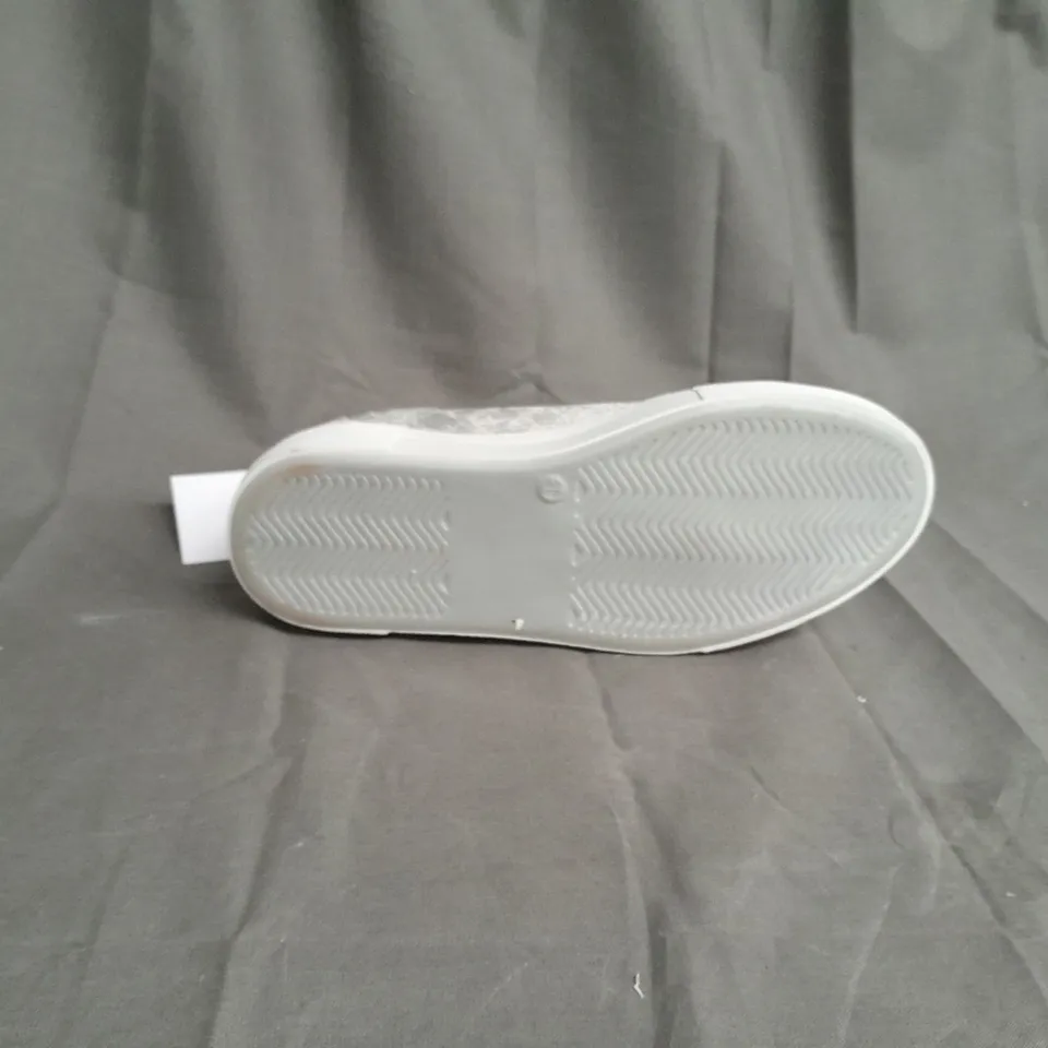 PAIR OF RUTH LANGSFORD TRAINERS IN SILVER SIZE 36 