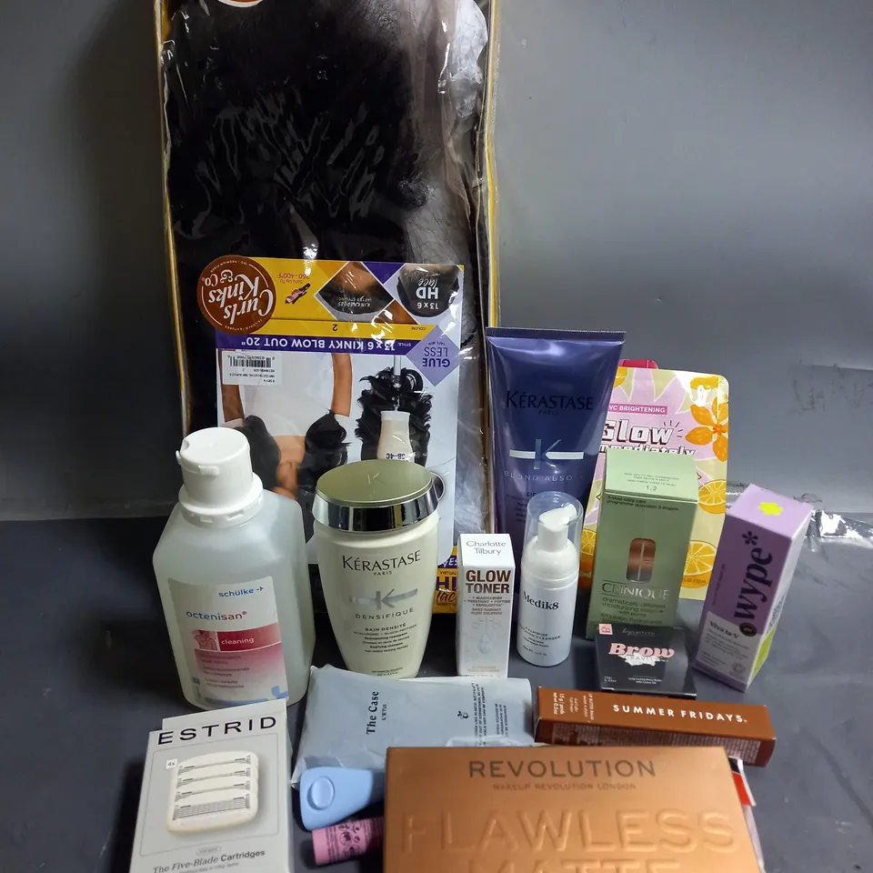 APPROXIMATELY 20 ASSORTED COSMETIC PRODUCTS TO INCLUDE - CURLY KINKS TEXTURED LACE WIG - REVOLUTION SHADOW PALLETE - CHARLOTTE TILBURY GLOW TONER - ETC 