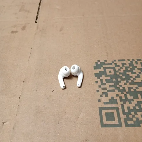 APPLE EARPHONES IN WHITE CHARGE CASE, MODEL UNSPECIFIED