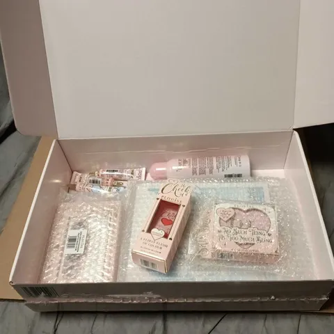 PLOUISE 8 ITEM GIFT SET TO INCLUDE LIQUID BLUSH, GLITTER SETTING SPRAY ETC