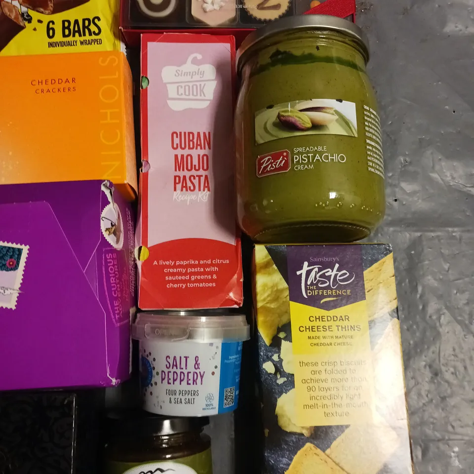 LOT OF APPROXIMATELY 15 ASSORTED FOOD ITEMS TO INCLUDE CHEESE CONDIMENTS AND PISTACHIO CREAM