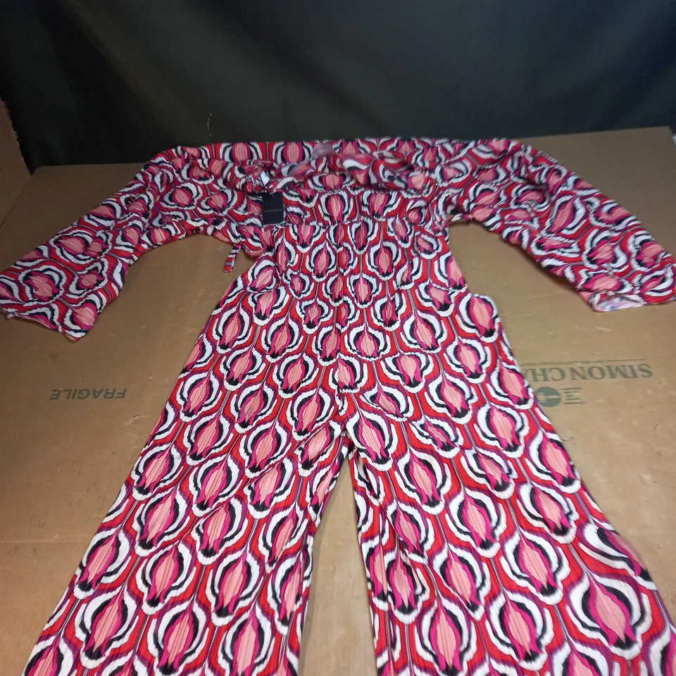 PRINTED PLISSE BATWING WIDE LEG JUMPSUIT SIZE M