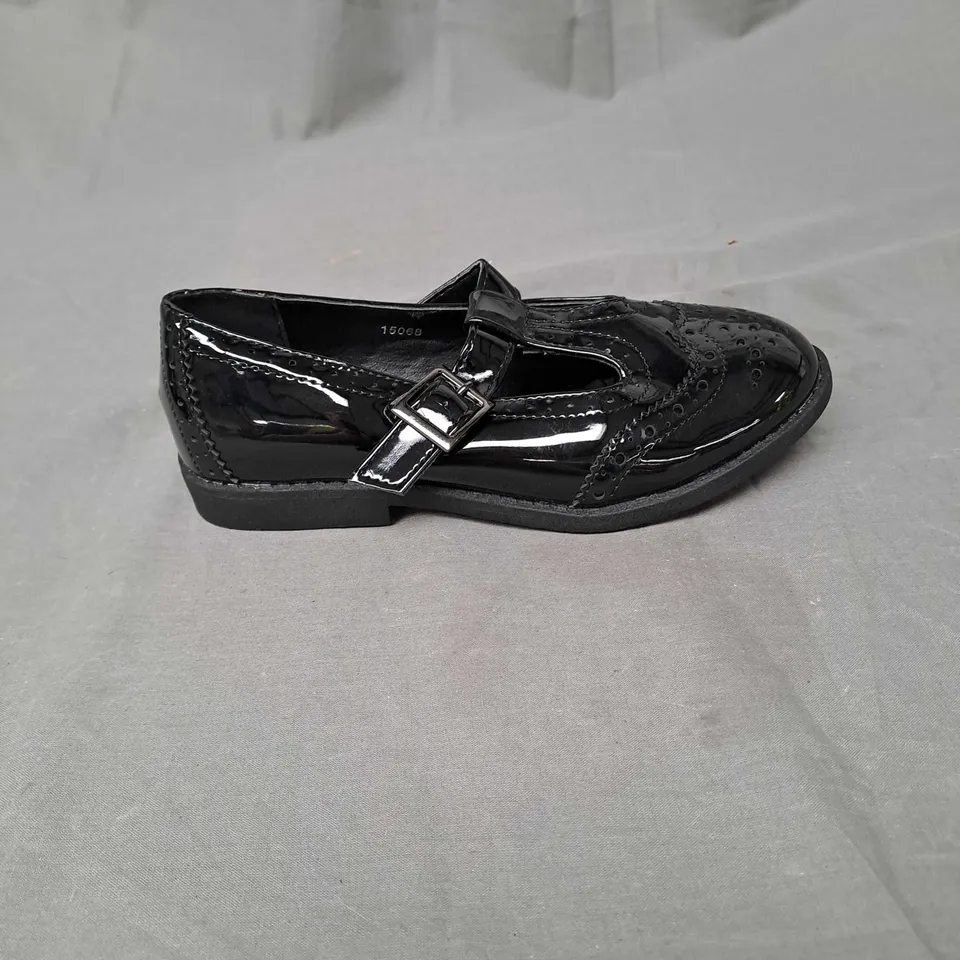 BOX OF APPROXIMATELY 12 PAIRS OF GIRLS SCHOOL SHOES IN BLACK - VARIOUS SIZES