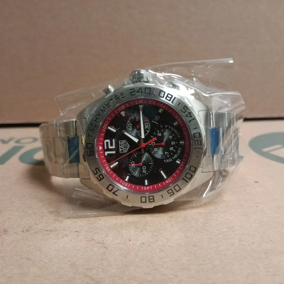 TAG HEUER STAINLESS STEEL CHRONOGRAPH WATCH – BLACK DIAL, RED TACHYMETER BEZEL