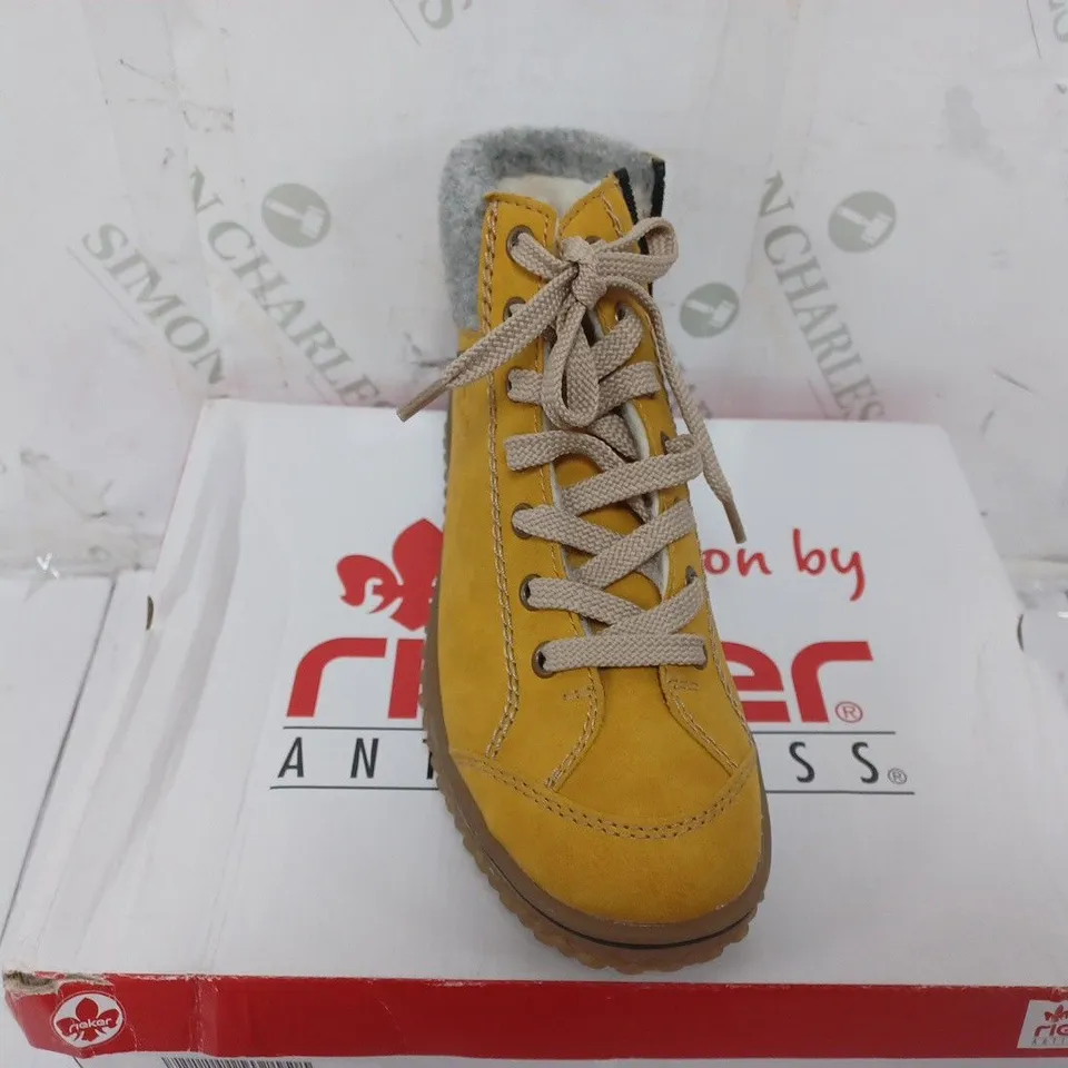 BOXED PAIR OF RIEKER LACE UP WATER RESISTANT BOOTS IN YELLOW SIZE 4