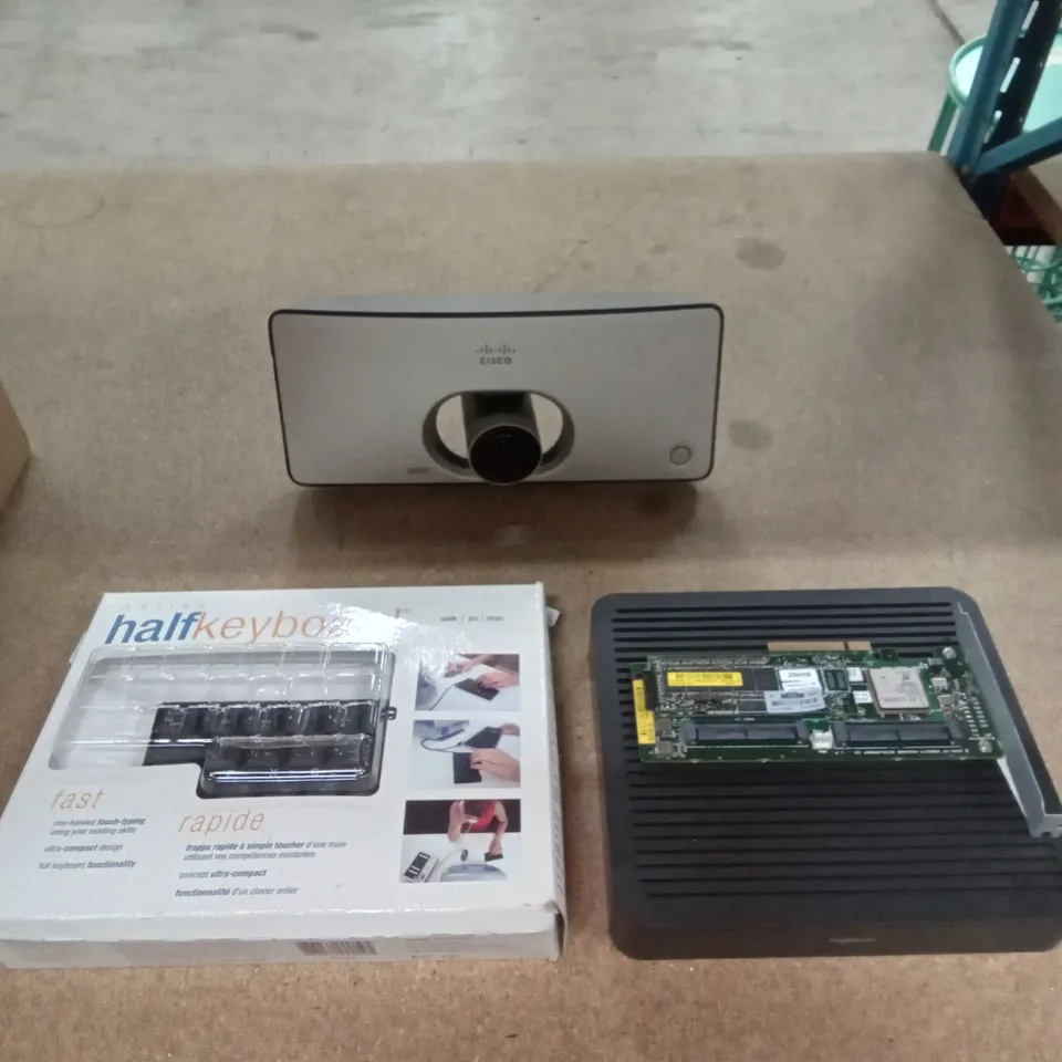 BOX OF ELECTRONIC INCLUDING CISCO HOME SECURITY CAMERA , MATIAS HALF KEY BOARD, LOGITECH ROUTER AND COMPUTER PARTS 