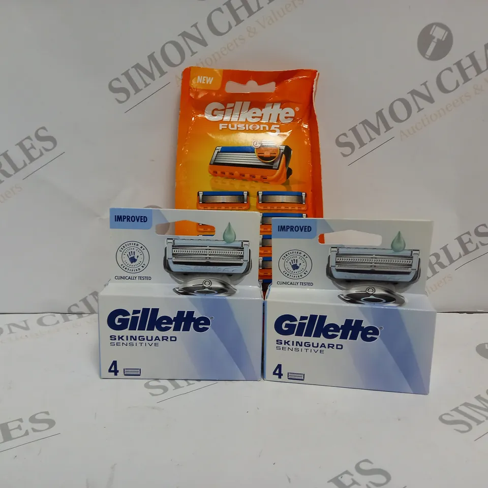 3 ASSORTED GILLETTE PRODUCTS TO INCLUDE FUSION 5 REPLACEMENT CARTRIDGES AND SKINGUARD SENSITIVE REPLACEMENT CARTRIDGES 