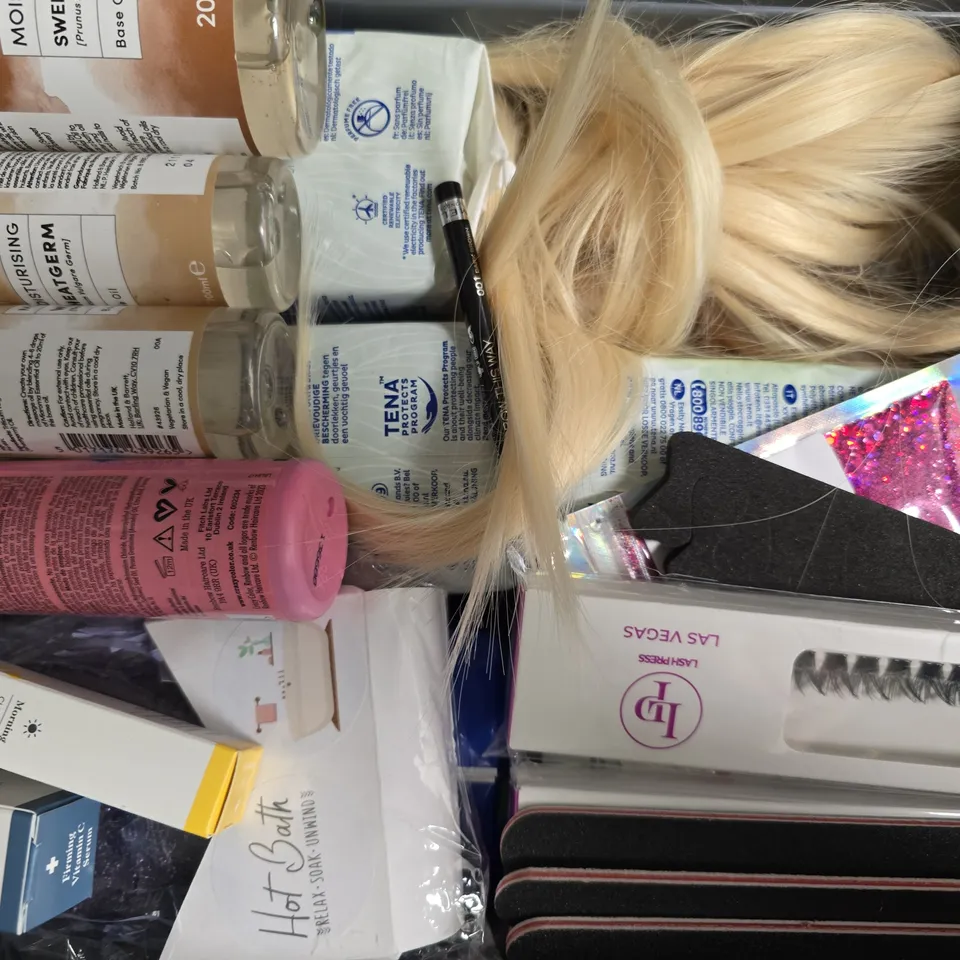 APPROXIMATELY 12 ASSORTED COSMETIC PRODUCTS TO INCLUDE TENA, NAIL LAMP, ETC